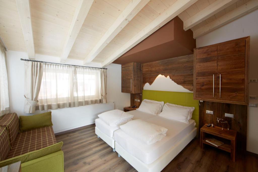 Chalet Vites Mountain Hotel Canazei Quarto foto